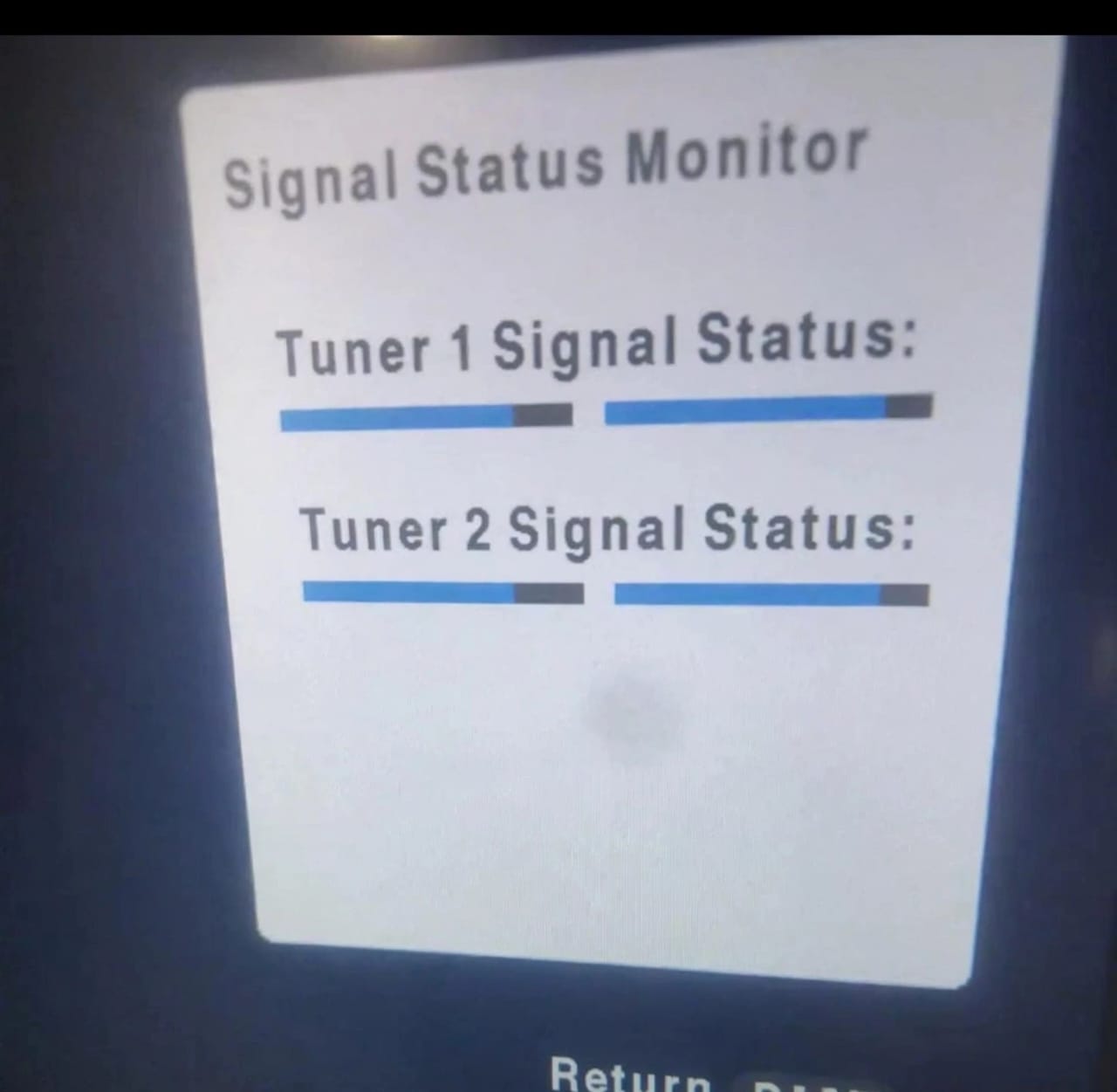 DStv decoder Signal Status Monitor screen showing Tuner 1 and Tuner 2 signal bars